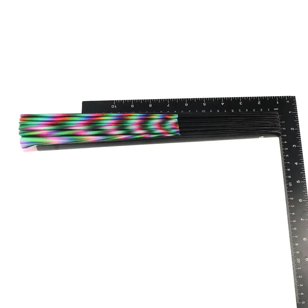 UV fluorescent handheld folding fan with a black ruler for scale