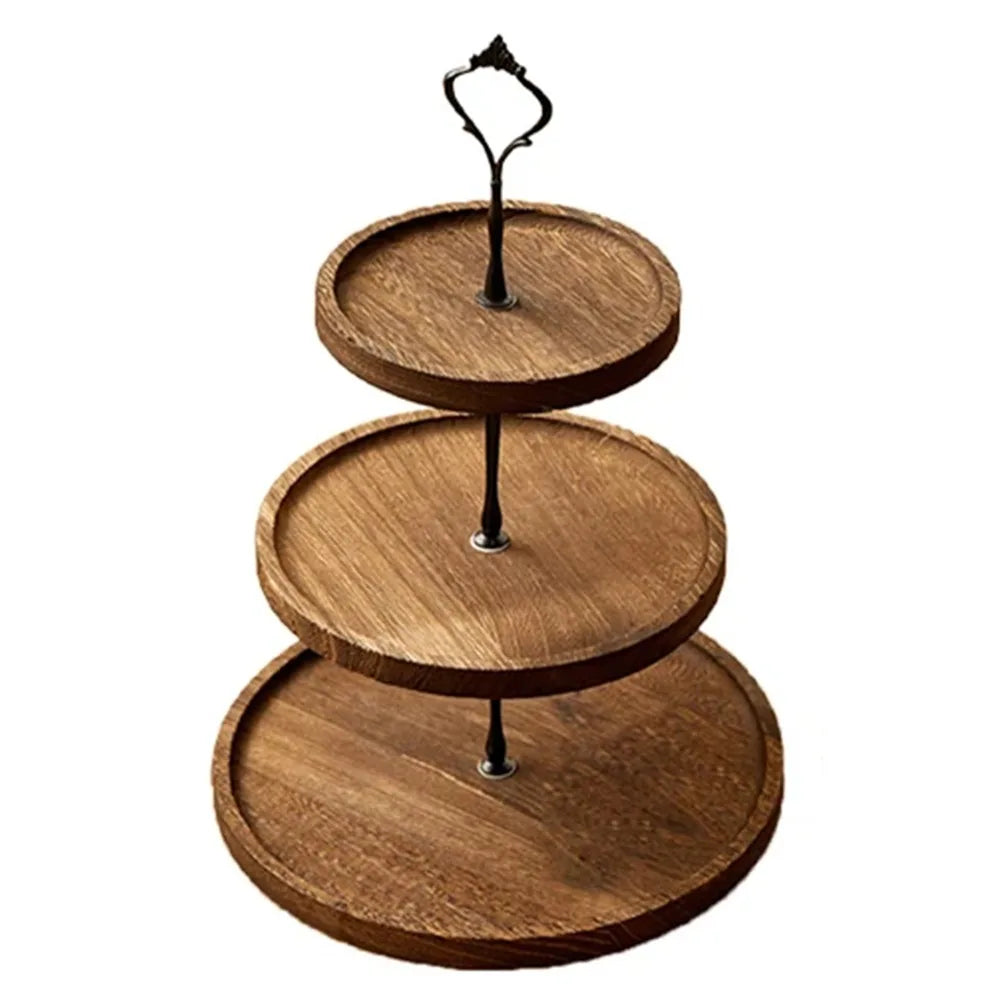 A wooden 3-tier cupcake stand with three circular layers and a decorative metal holder.