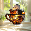 Halloween ghost reading book window hanging decoration made of stained glass featuring a cat and a ghost face