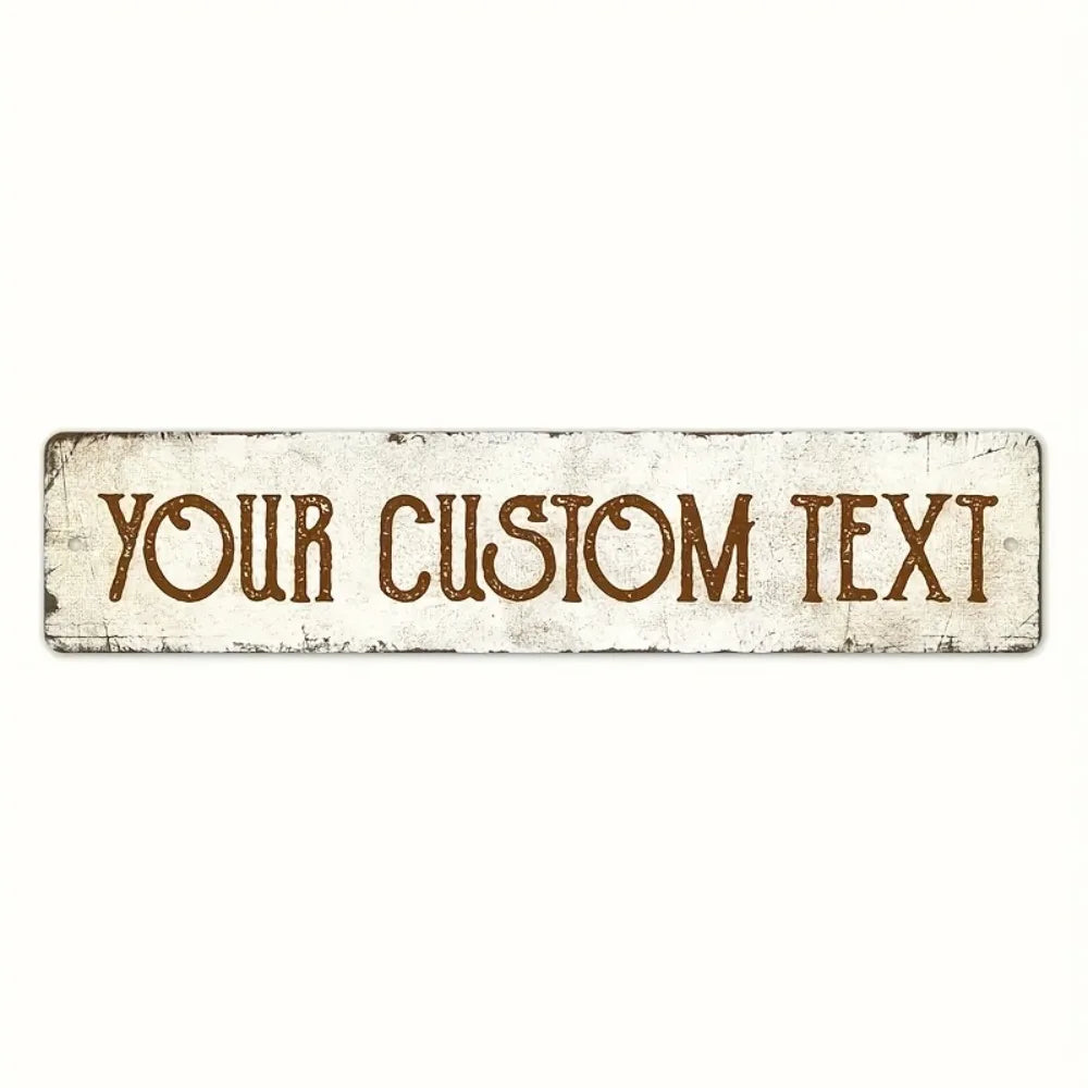 A rectangular vintage metal sign with distressed white background and brown text that reads Your Custom Text.