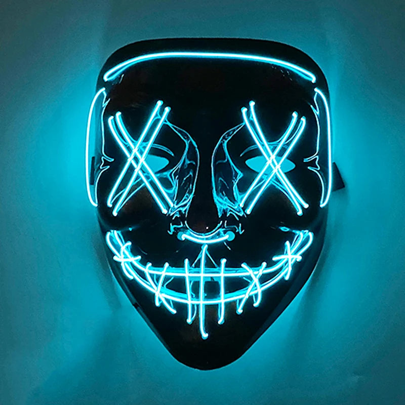 A black mask with glowing blue LED lines forming an 'X' pattern and a jagged smile, mounted on a wall.