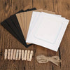 A stack of vintage kraft paper photo frames and a bundle of small wooden photo strips on a wooden surface.