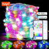 A bundle of RGBIC color changing LED fairy string lights with a smartphone displaying a control app.