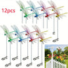 Twelve realistic dragonfly hat clips used for garden decor