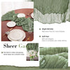 A set of terracotta semi-sheer cheesecloth fabric used for table settings and decor.