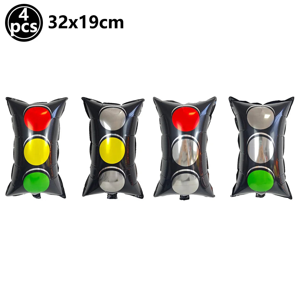 Four automotive style race car number balloons in red, yellow, silver, and green for party decorations
