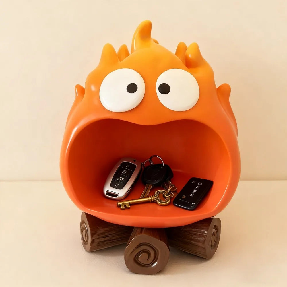 An anime-inspired fire spirit resin key tray and desk organizer shaped like a grinning orange face.