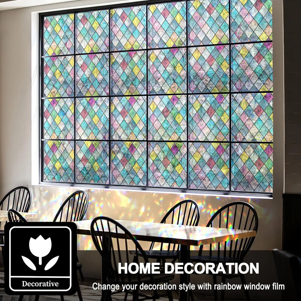 A large window covered with colorful rainbow stained glass film in a grid pattern, displayed indoors.
