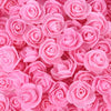 A dense bulk pack of realistic pink foam rose flowers for weddings and events.
