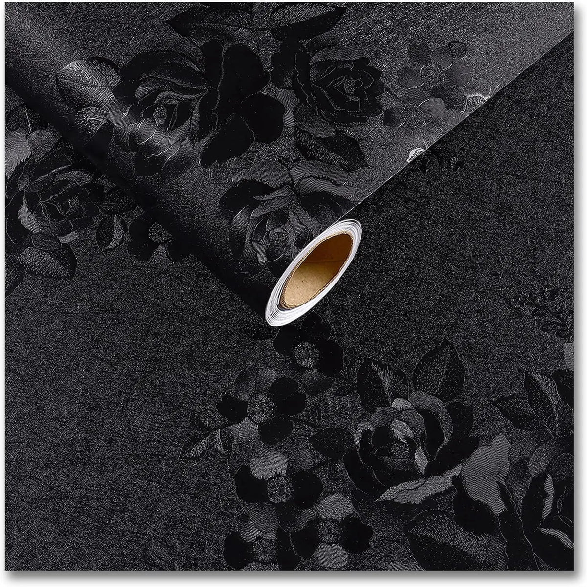 A sheet of vintage black floral self-adhesive contact paper is shown diagonally, revealing a rolled edge.