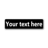 A black rectangular sign with the text Your text here, suitable for customizable vintage tin sign wall art.