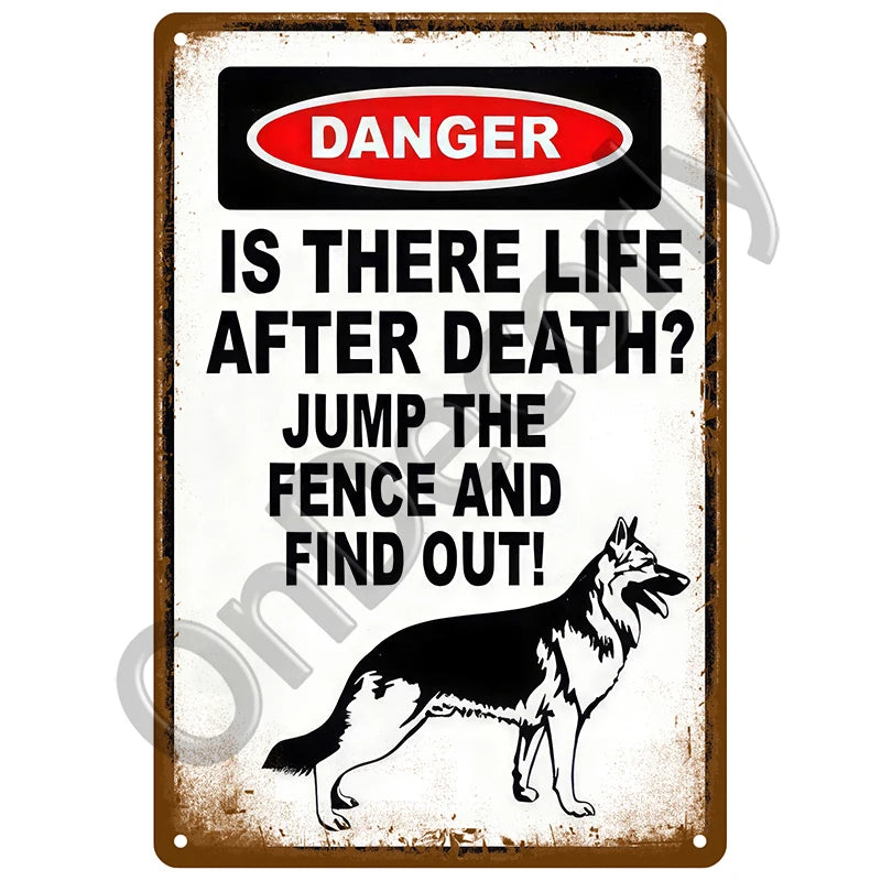 A vintage metal sign with a black and white graphic warning that asks Is there life after death? Jump the fence and find out!