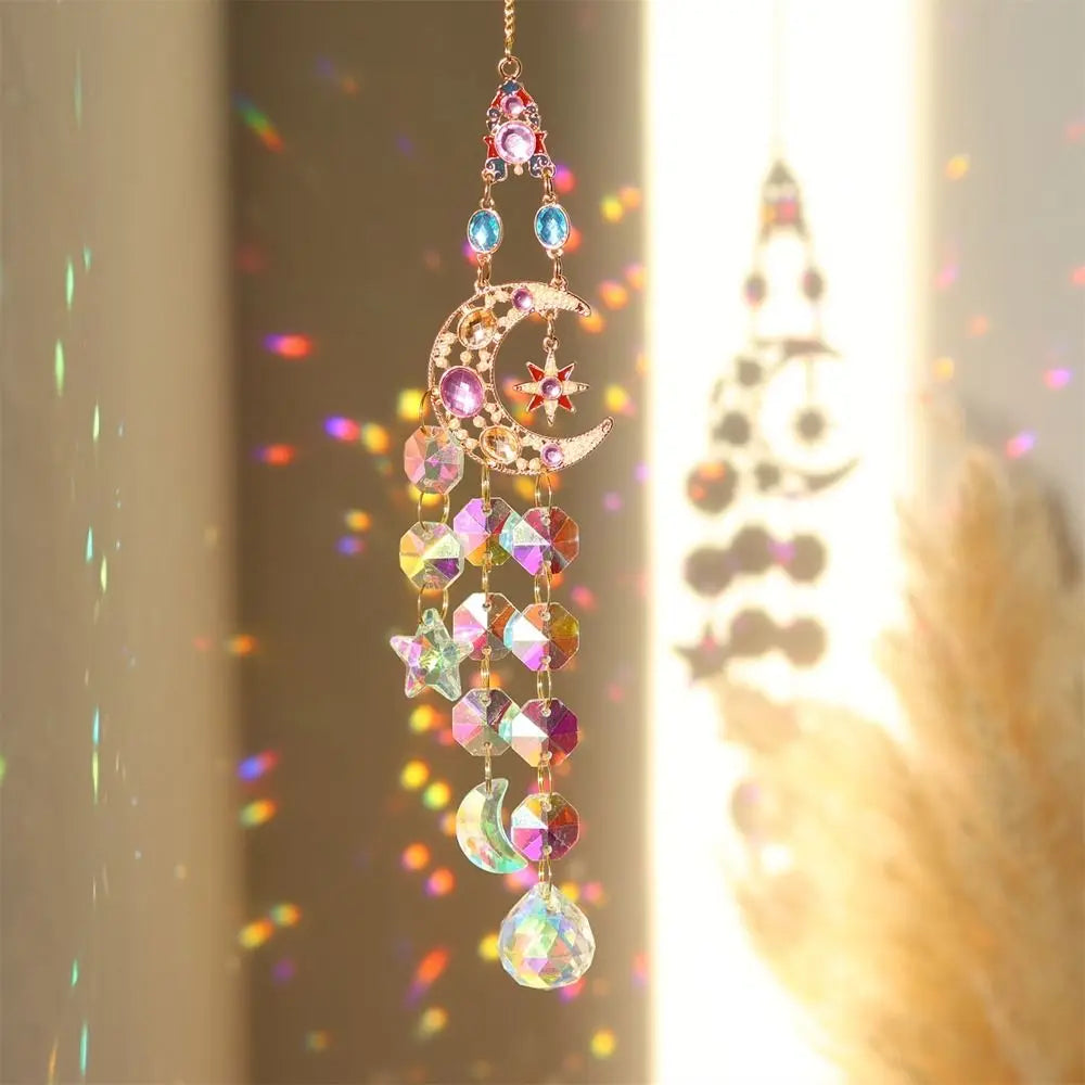 A hanging crystal suncatcher wind chime ornament featuring a crescent moon shape made of colorful glass beads.
