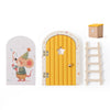 A wooden fairy elf door miniature decoration featuring a yellow door, a star cutout, and a small tooth box.