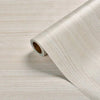 Roll of self-adhesive PVC wallpaper film with a light wood grain texture on a surface.