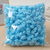 A clear plastic bag filled with light blue PE foam artificial rose flowers for DIY decor