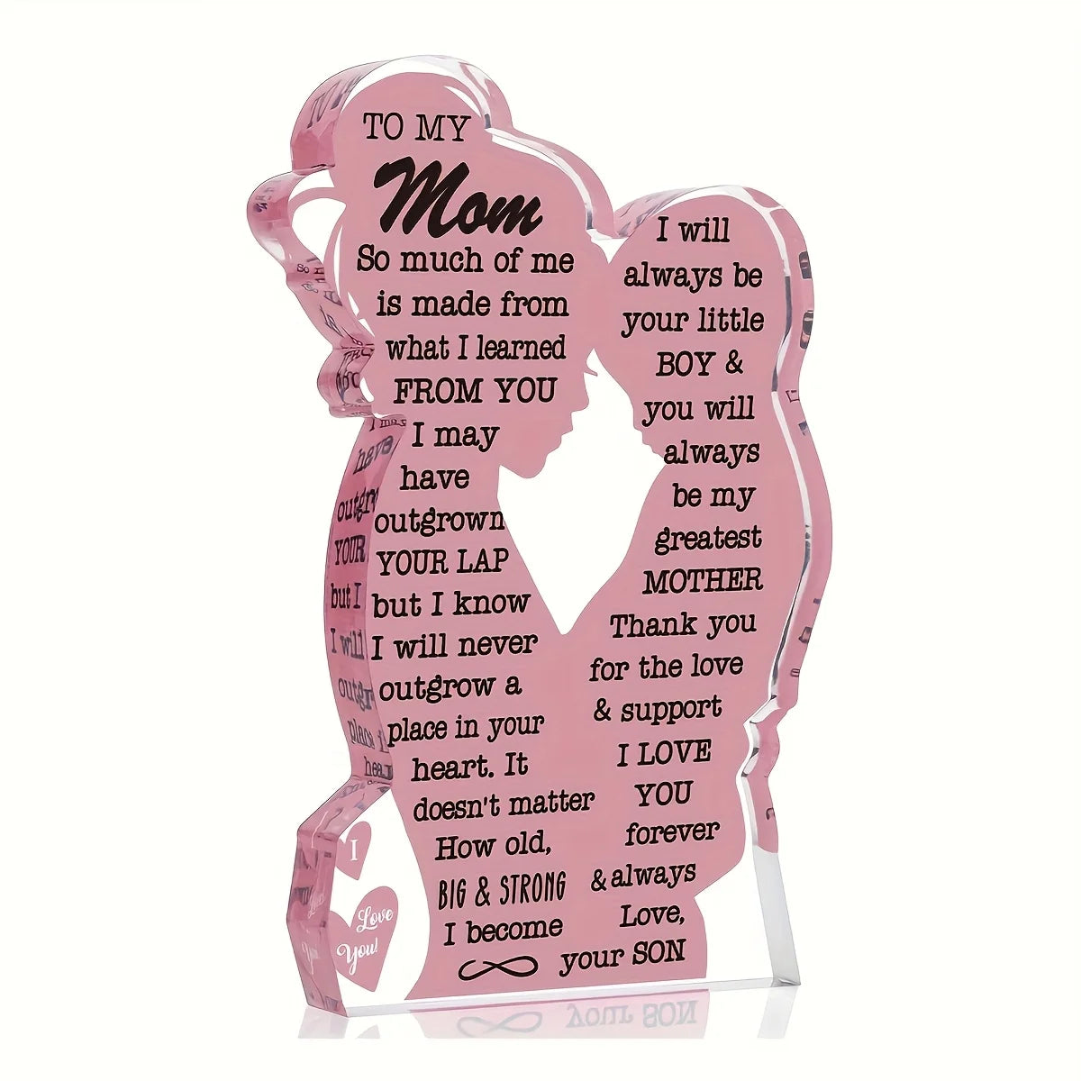 A pink acrylic plaque shaped like a silhouette of a woman with a heartfelt message inside