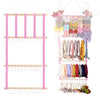 Wall-mounted headband holder displaying various colorful fabric headbands and hair accessories.