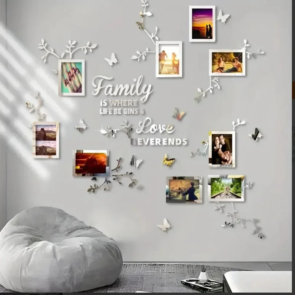 A wall decorated with various photo frames and floral decals featuring the word Family is where life be gins Love Everends