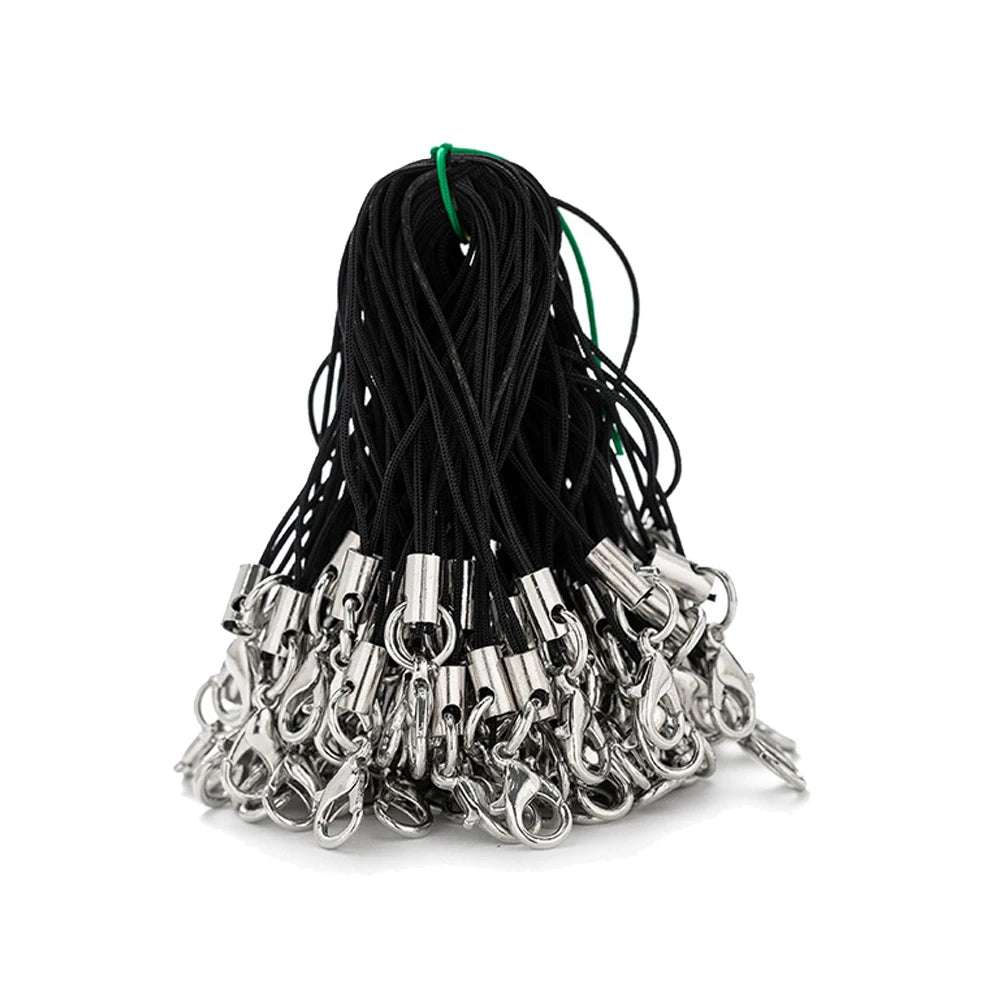 A bundle of black and green lobster clasp lanyards and straps for jewelry making