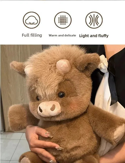 A brown West Highland Calf plush toy is being held by a person.