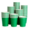 A stack of green disposable paper plates in various sizes and heights.
