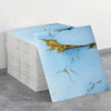 A stack of self-adhesive marble tile stickers featuring abstract gold veining on a light blue background.