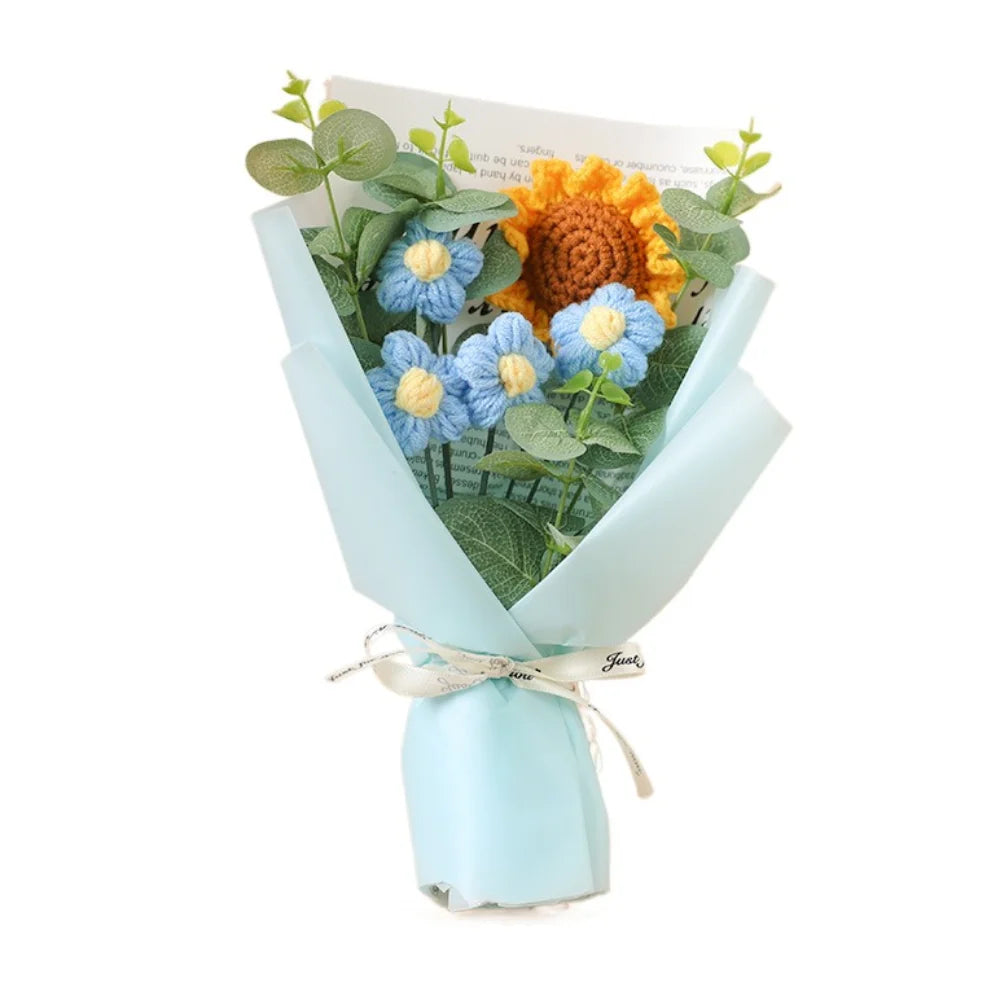A bouquet of handmade sunflower and daisy crochet flowers in blue and orange.