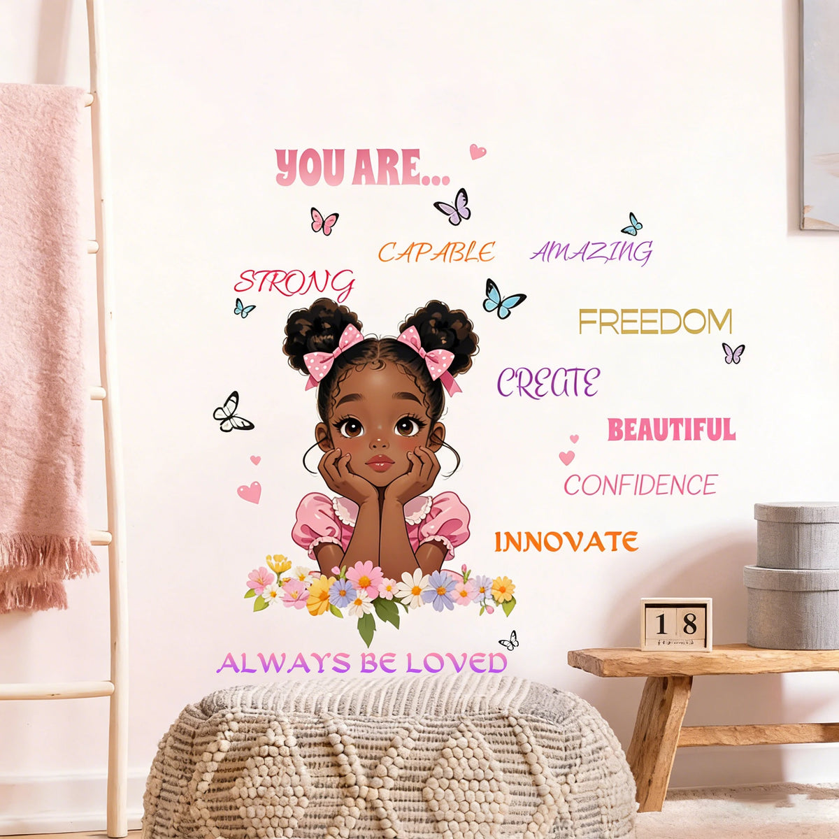 A motivational wall sticker featuring a girl with butterfly accents and positive words like strong amazing freedom and beauti