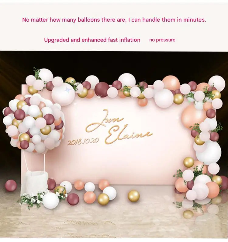 A display of various colored balloons arranged in a floral arch, with the name Elaine written on a pink background.