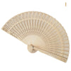 Hand carved bamboo folding fan with a light beige color and intricate cutouts