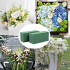 Green floral foam blocks used for party decor alongside various floral arrangements.