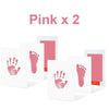Two pink handprint and footprint ink pads displayed on white cards.