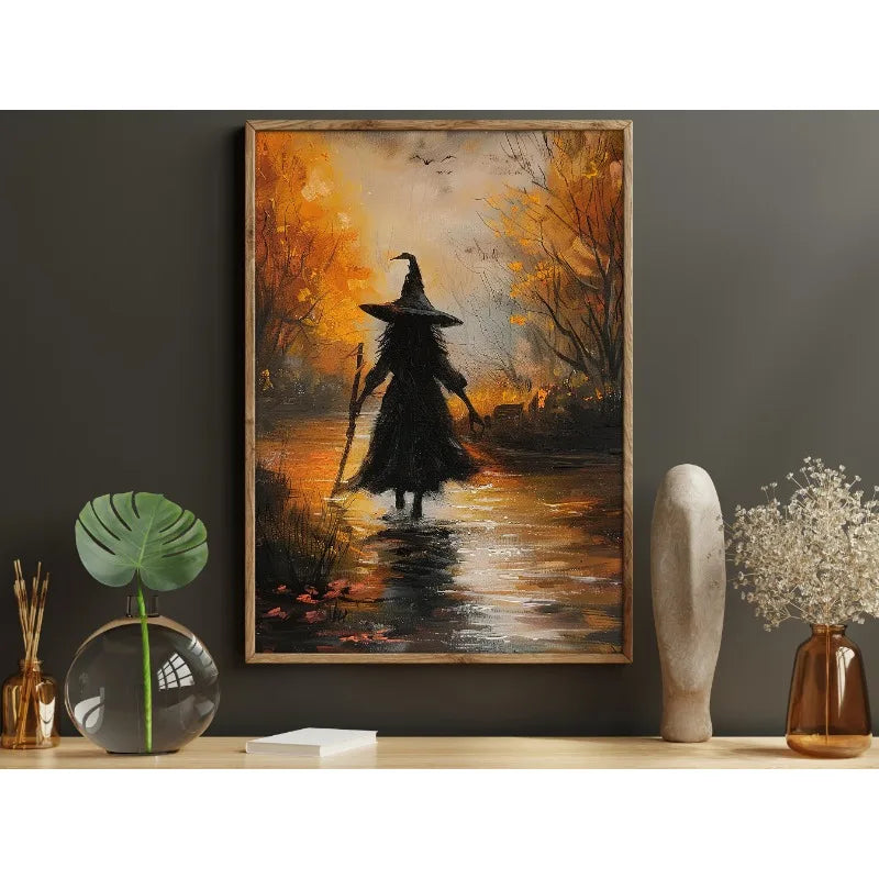 Canvas wall art depicting a dark witch in a cloak standing in a misty forest with autumn foliage.