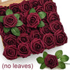 A box filled with deep burgundy foam rose flower heads for weddings and DIY crafts.