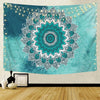 Bohemian mandala tapestry wall art featuring a teal and white floral design with string lights in the background