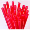 A collection of bright red heart-shaped disposable straws in a vertical arrangement.
