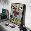 A framed poster of the Vinland Saga anime featuring a close-up of a character's face and a vintage car.
