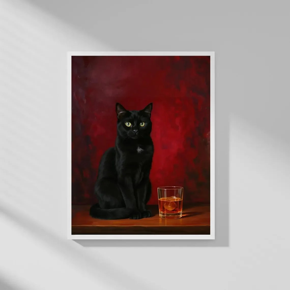 A black cat sitting on a wooden surface against a dark red background, next to a glass of amber liquid.