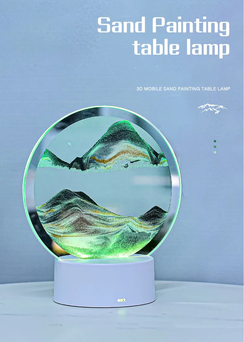 A 3D mobile sand painting table lamp displaying a textured, green and yellow landscape on a circular base.