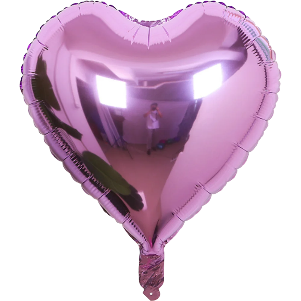 A pink heart-shaped foil balloon filled with air, featuring a star design.