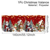 Festive Christmas valence made of polyester featuring Santa figures and Christmas trees on a red background