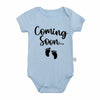 Light blue baby bodysuit with black text that reads Coming Soon