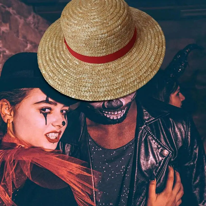 A close-up portrait of a person wearing a straw hat and dark clothing with dramatic makeup.
