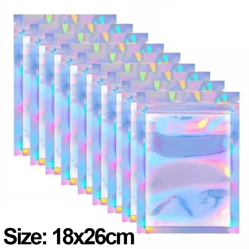 A set of holographic rainbow resealable bags stacked in a row.