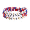 A set of patriotic beaded stretch bracelets featuring the American flag design in red, white, and blue.