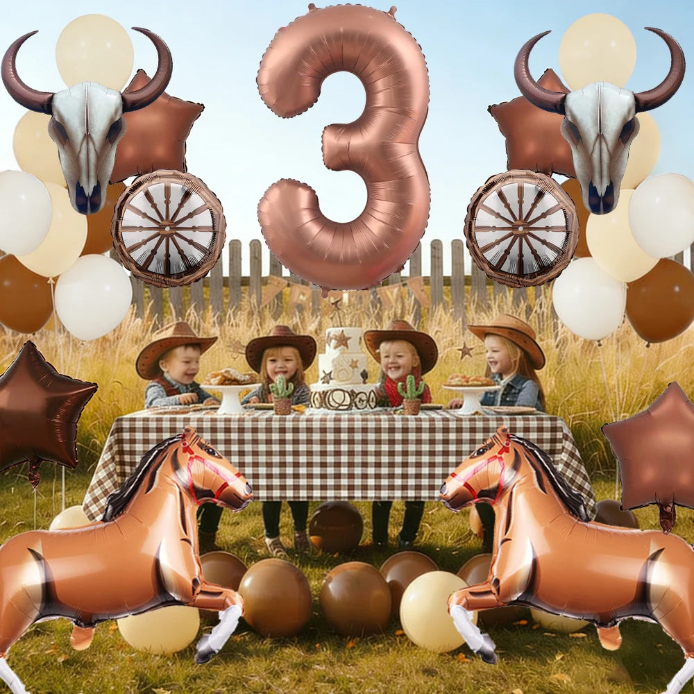 A set of western theme foil balloons shaped like the number three and decorative horse figures.