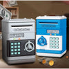 A silver and blue interactive roll-up piggy bank with a digital keypad and coin slot is shown next to some currency.