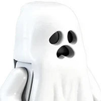 A white ghost-shaped building block collectible featuring black eye holes.