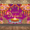A vibrant backdrop featuring pink and orange floral decorations, golden diyas, and the text Happy Diwali.